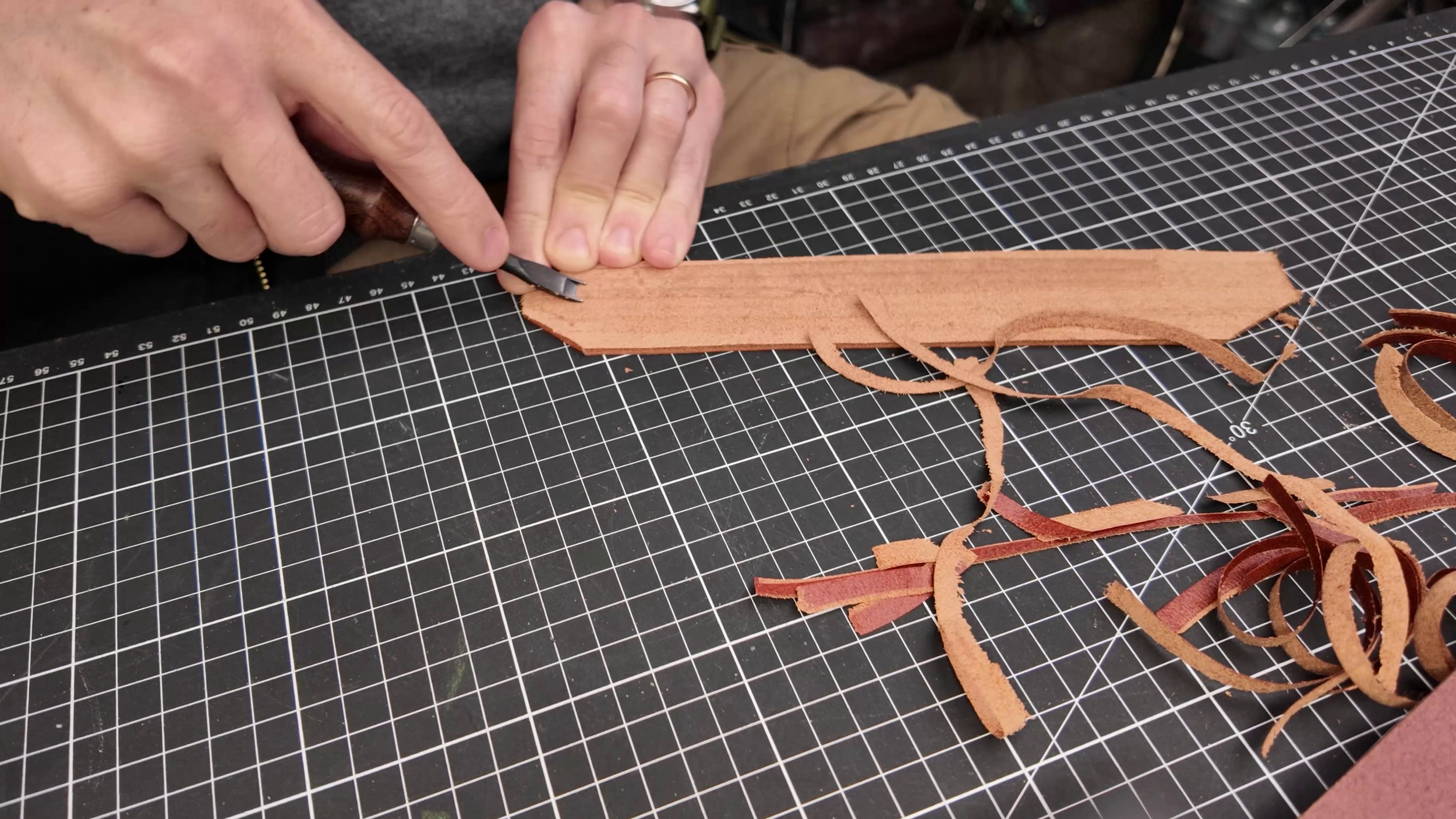 Skive your leather D-ring tabs to size.