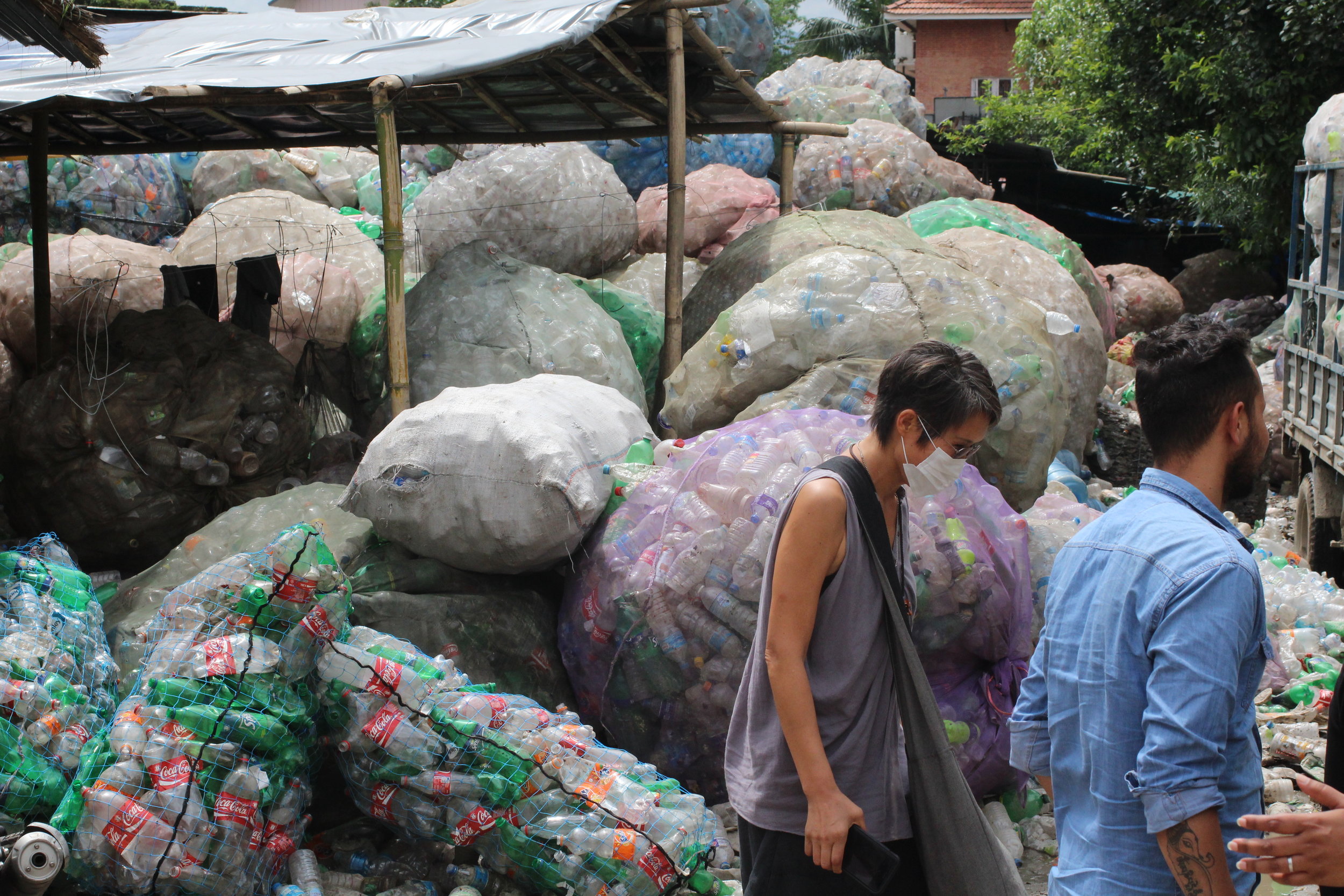 One of HCI's NGO program: Friends of the city, allows for plastic bottle collection by women workers to increase their ability to provide for their families 