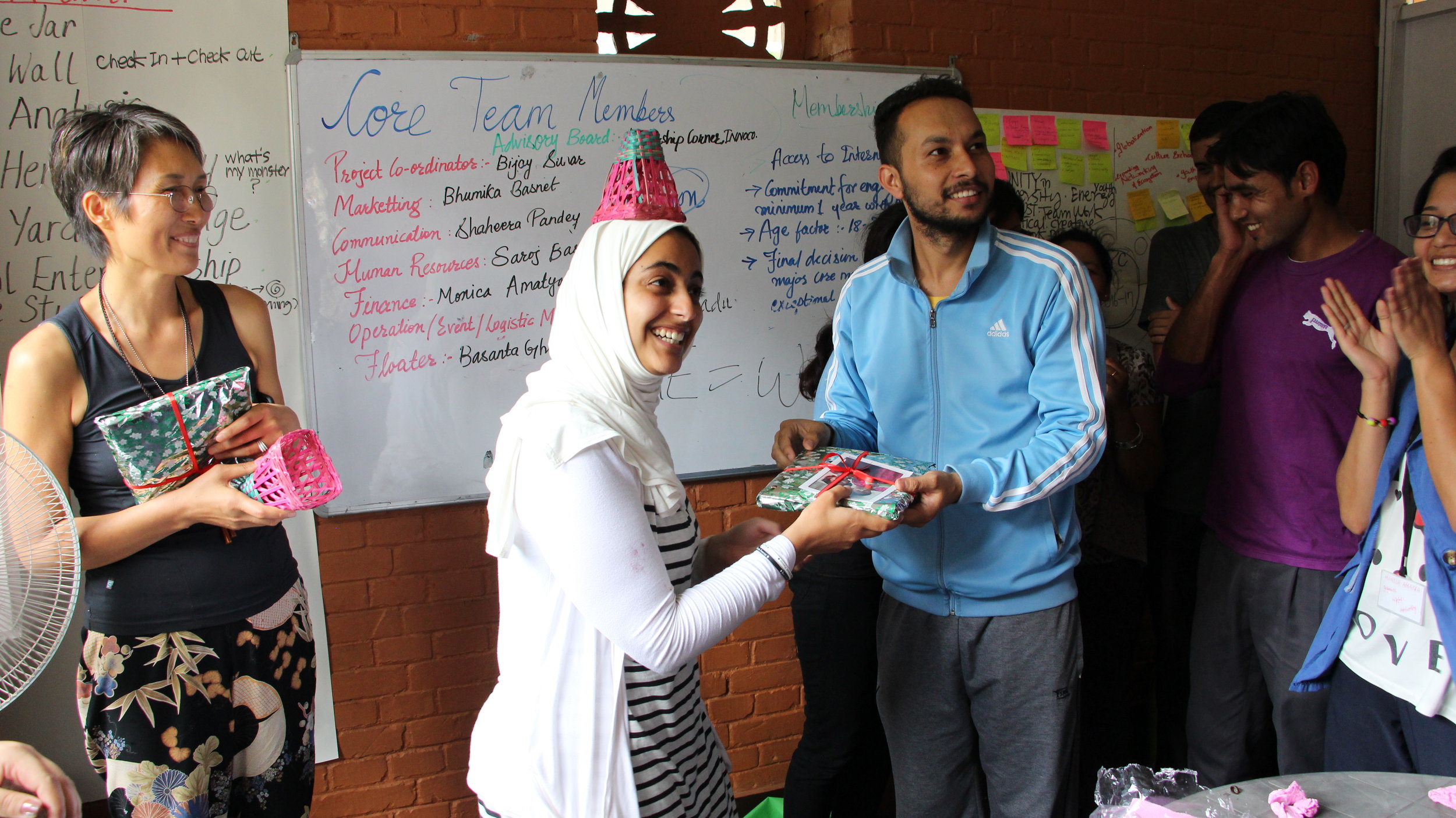 Receiving gifts from the youth participants
