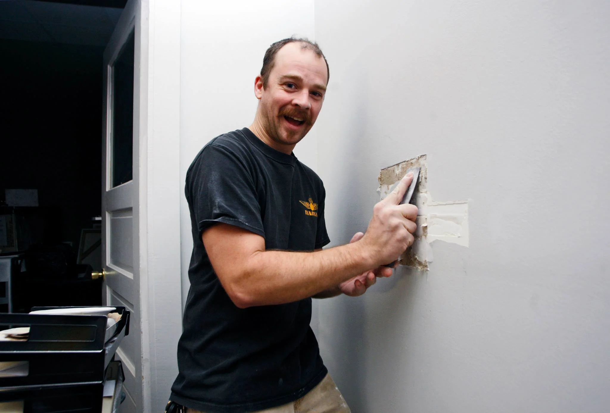 Andy Denton preparing our new studio walls.