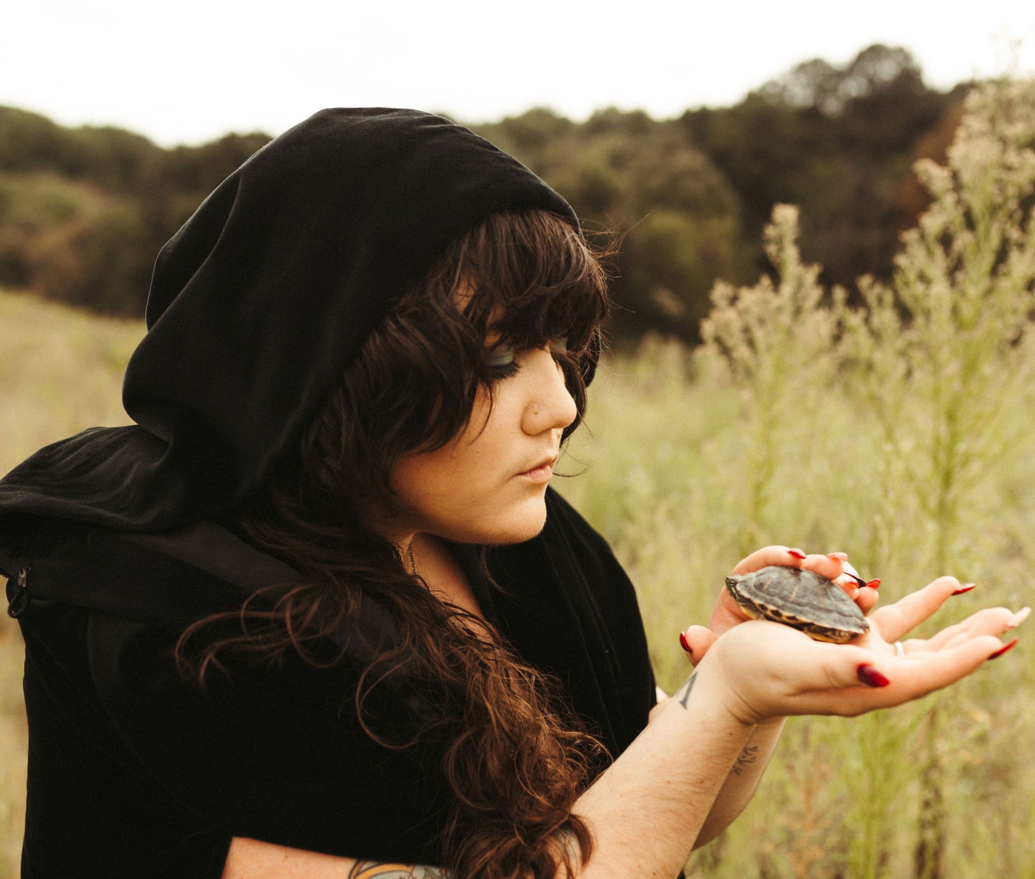 Alessandra holding turtle landscape.jpg