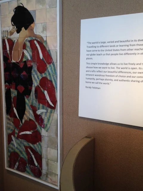 "The world is large, varied and beautiful in its diversity." Today, Chris is designing a window with an East Asian theme. Randy Feldman, an attorney with an office in the building, donated all the exhibit materials from his personal art collection. Please walk past on Main Street to view these incredible windows.