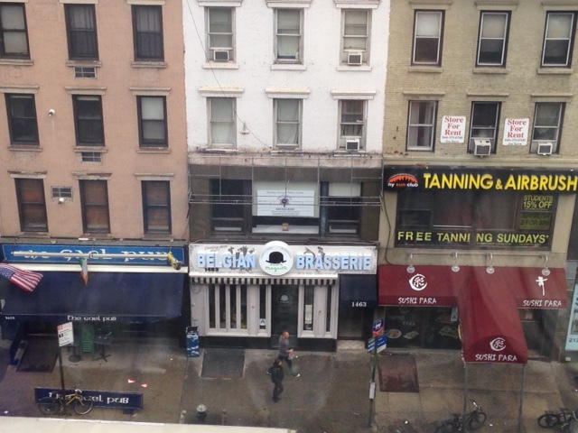 Here is Jane Jacobs’ ideal in this photo – mixed use with commercial store fronts and local small businesses on the street level floor and residential units above. Even early in the morning, one can see the people walking past on the sidewalk.