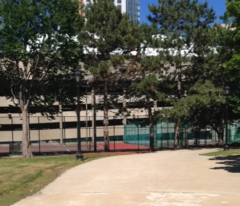 Parking lots on the outer rings show how auto-centric this project was from the beginning.