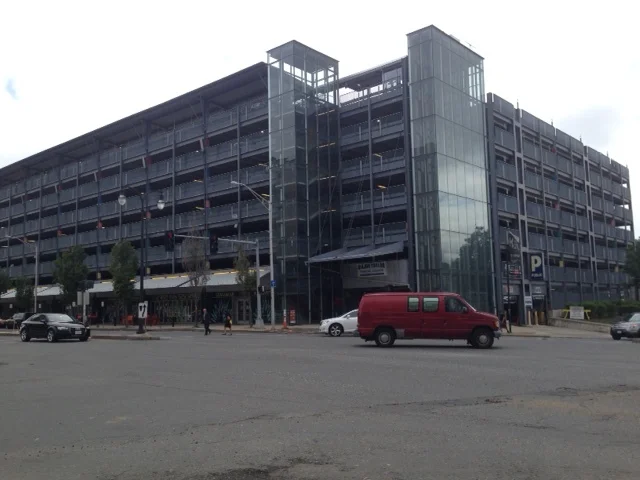 If you are able to cross the street, you will find the Major Taylor Boulevard Municipal Garage. There is a tiny nod to the idea of "mixed use" with the storefront restaurant Mezcal Cantina on the lower level, but it is hard to disguise this parking complex. Most people who attend events across the street at the DCU Center will park here. It is the typical, park-enter building- exit and leave" kind of project, but where else would someone have to go to walk around here? Let's take a breath and try to get to the other side of this highway type of road to go over to the DCU Center.