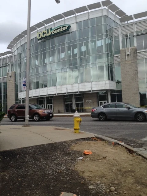 Welcome to the DCU Center and try not to trip on this sidewalk! We have a good start here - plenty of windows, access doors out on to the sidewalk and the building faces the main street! Hooray!!