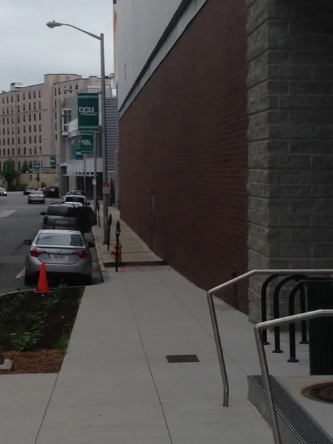 Here is the Commercial Street side of the DCU Center. The main entrance is on the opposite side so I'm thinking that all these locked doors I am passing are only meant for emergency exit? In any event, it's been about 45 minutes. I'm in downtown Worcester and I might have passed by 3 people so far on this walk. Even Worcester Wares on this side is not open around 10:30 on a Tuesday morning. I love cities for the active street life, the people watching, the spontaneous interaction and conversation. None of that here in the heart of downtown during the weekday. Help me! I think I'm having an existential crisis in the middle of the city this morning. Send out some reinforcements. I'm so lonely out here! 