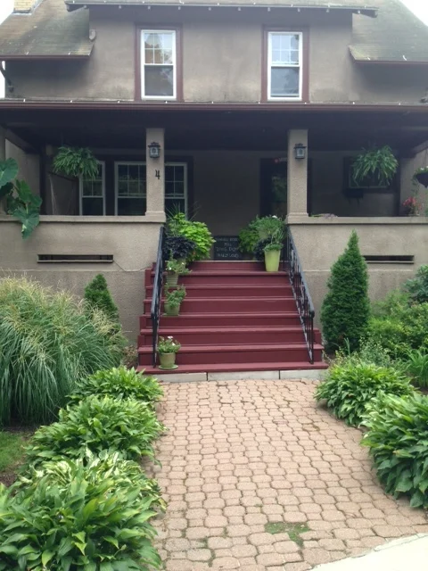 Many of these front porches function almost like an extra room, extending the living space to the outdoors.