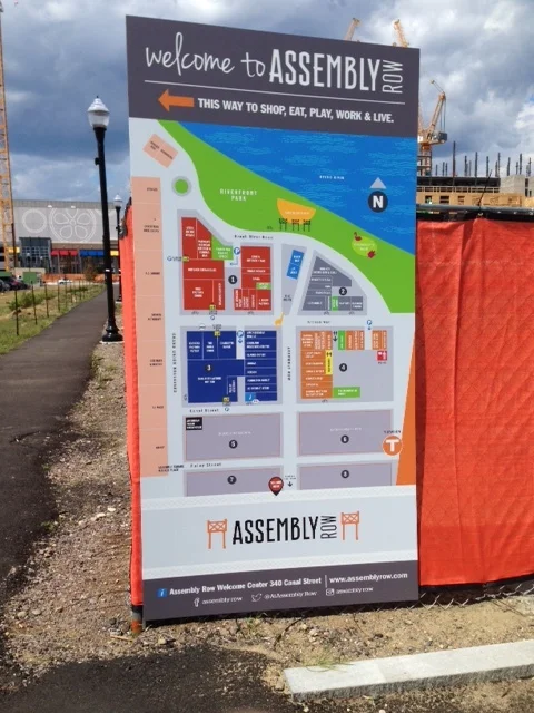 If you head into the Welcome Center on Canal Street, you can pick up a detailed brochure with a map listing all the stores where you can spend your money. Assembly Row is a twenty four hour, mixed use community with housing, commercial and office space. Four blocks of the development have already been completed to date but you can see the cranes and workers continuing to build out on the adjacent empty lots. In the photo above, you can see the vacant, to-be-developed lots outlined in gray.