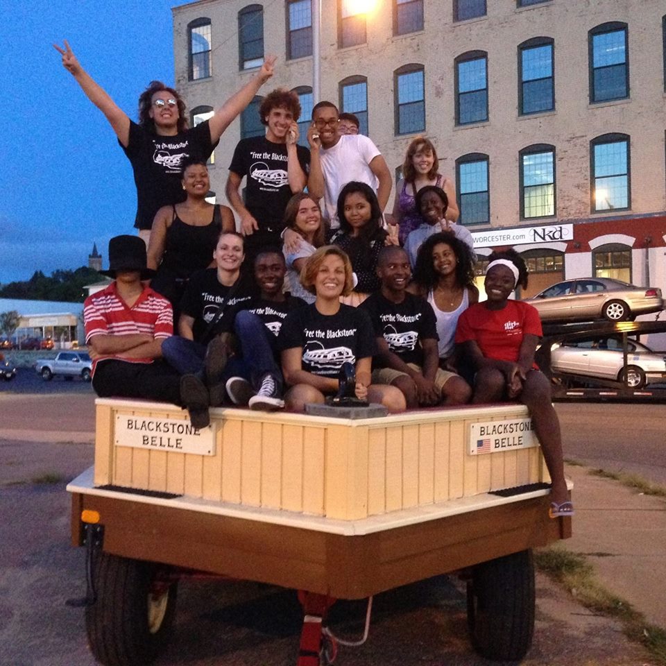 During the summer, South High Community School students trained as docents and interpreters, lead horse and wagons tours of the Canal District. The tours begin in the parking lot of Crompton Place.