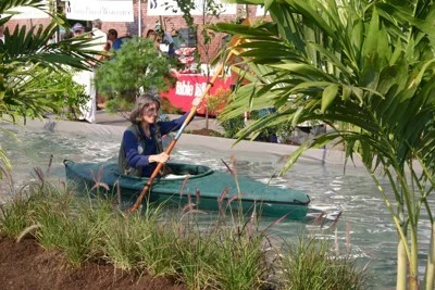 Since 2000, citizen-led volunteer efforts have been directed to reviving the Canal District and advocating to re-create the canal. During the annual Canalfest, Harding Street is closed to traffic and a makeshift canal is set up (see photo) to give locals a taste of what it would be like to reopen the canal. Local residents have also organized the yearly Canal Diggers 5k Road Race. This past summer, the Water Street businesses organized a once-a-month Canal District Art Walk. The sidewalks exploded with life. Musicians jam and local artists set up displays of their work. People spill out into the sidewalks to experience the action.