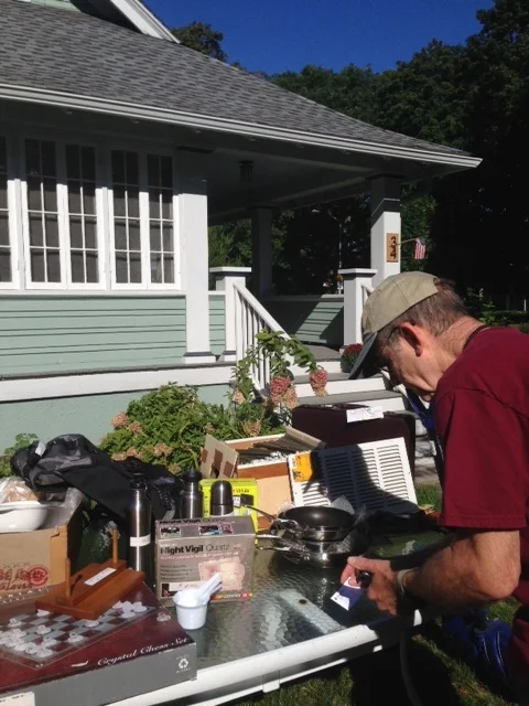 Paul selling some pots and pans at the community yard sale. We talked for such a long time that he even invited me in for a tour of his craftsman house. I sat on his porch for a bit and watched people walk down the pedestrian lane. 