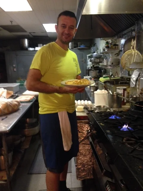 Alex works in the back kitchen on the busy weekend mornings. He knows exactly how I like my omelet cooked.