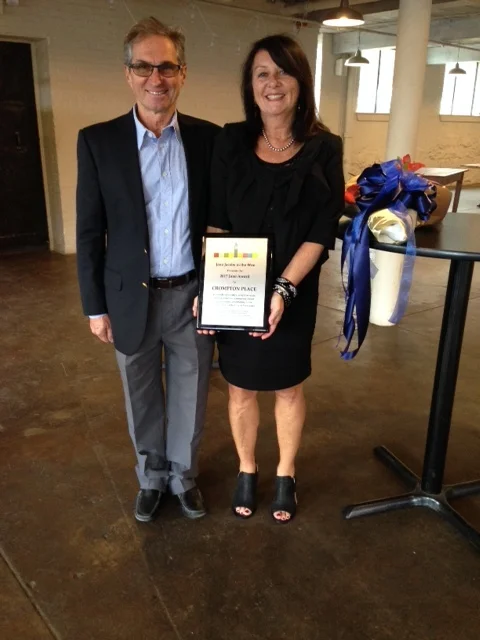 Dino and Robin Lorusso accept the 2017 Jane Award at a ceremony at Crompton Place on Sunday, May 7, 2017.