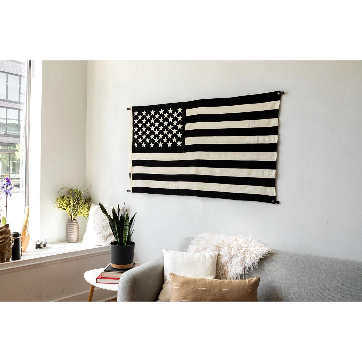 Our flags can be styled for all types of spaces! For a modern living room our Black and White Flag lends a stark graphic contrast against a light wall. While the warm wool lends a softness that can&rsquo;t be captured in a print. Let us know if we ca