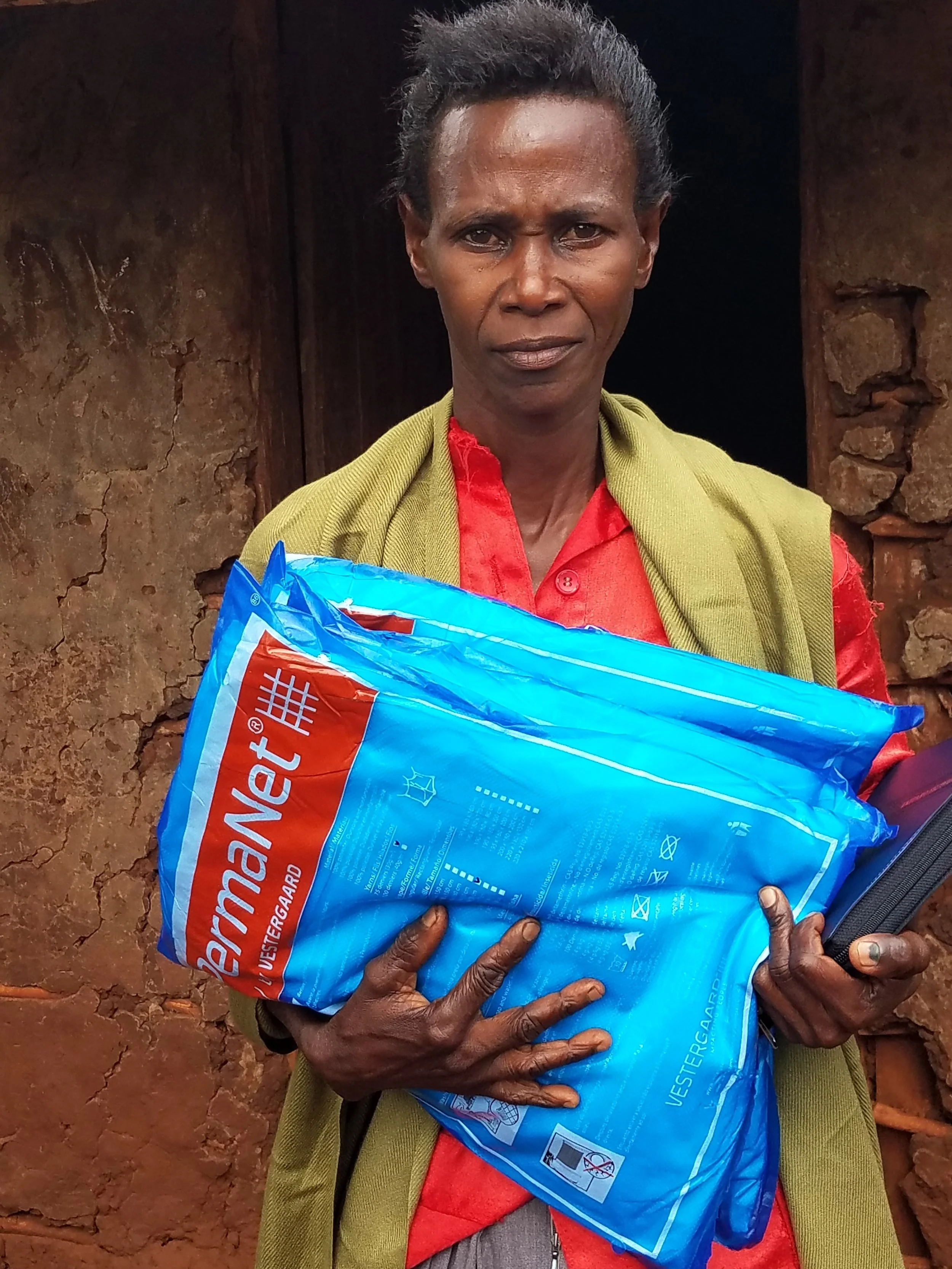 Malaria Net GIG Woman.jpg
