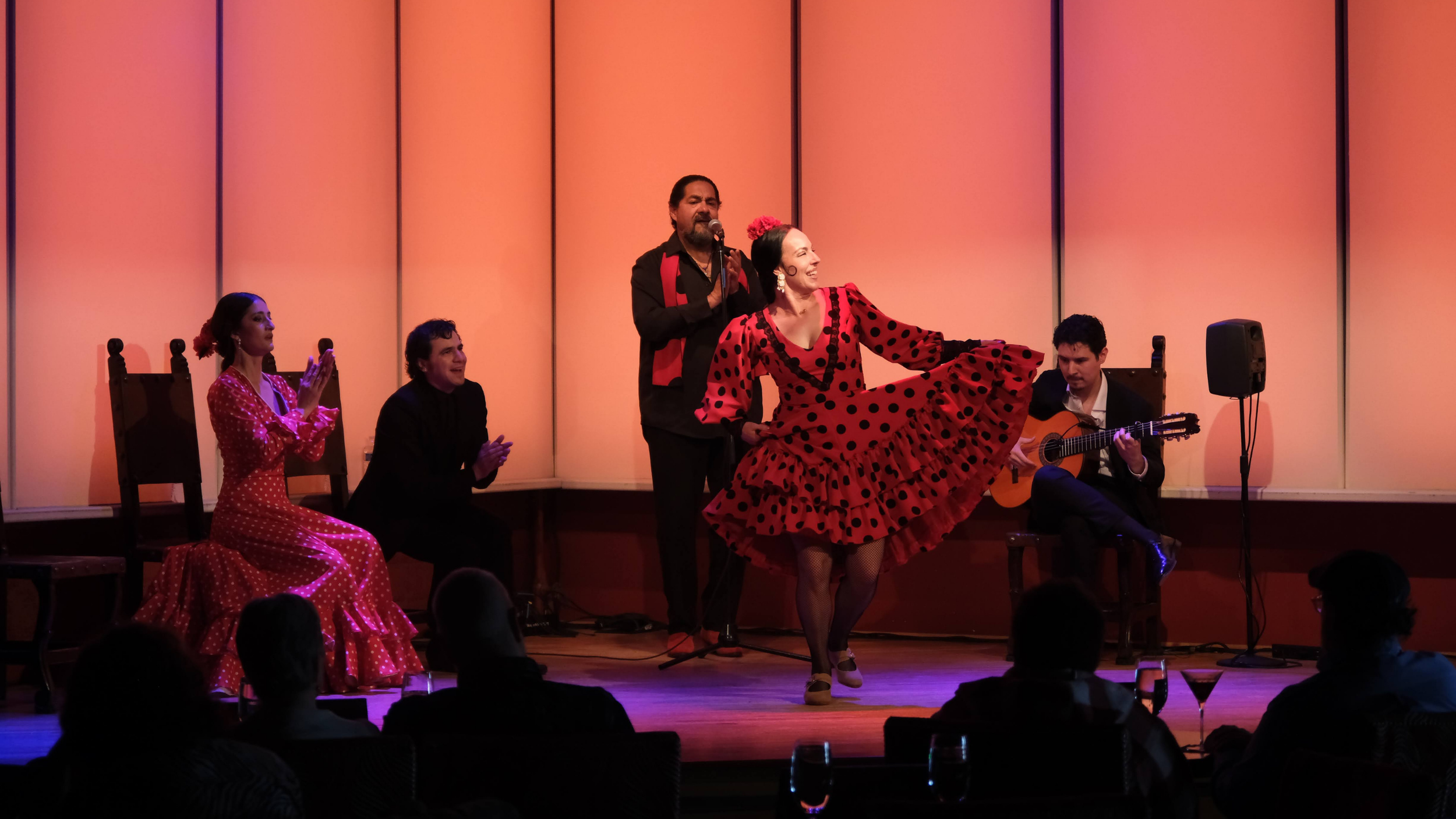 Audience applauding a live flamenco performance at Tablao Flamenco Albuquerque