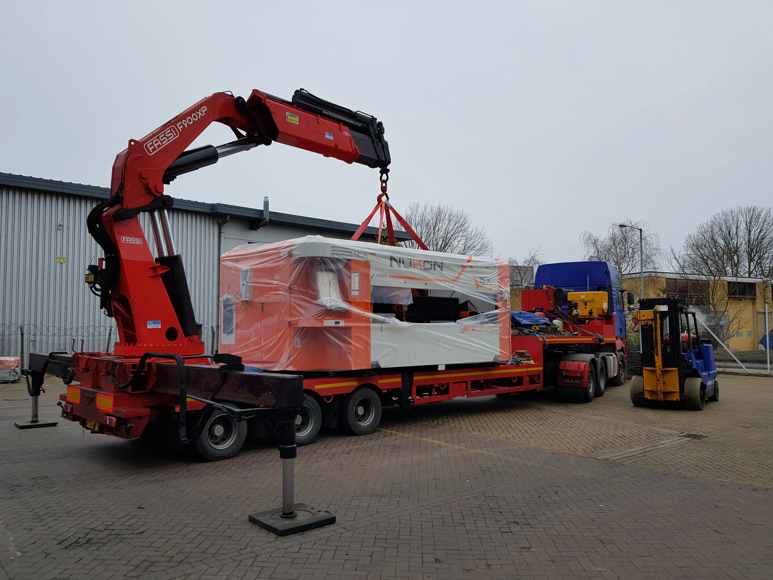 Unloading New Laser with Hiab