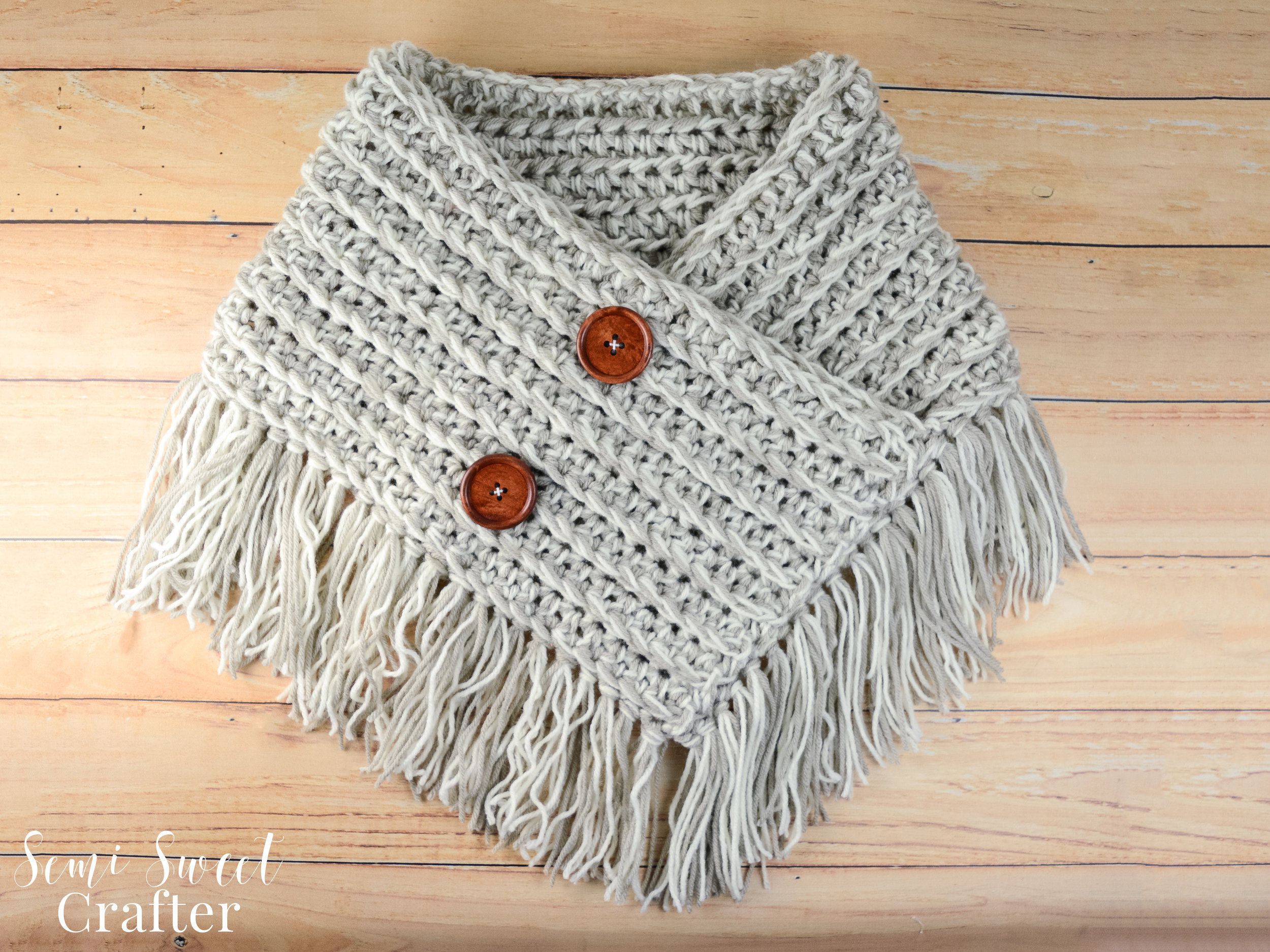 Knitted cowl with buttons pattern