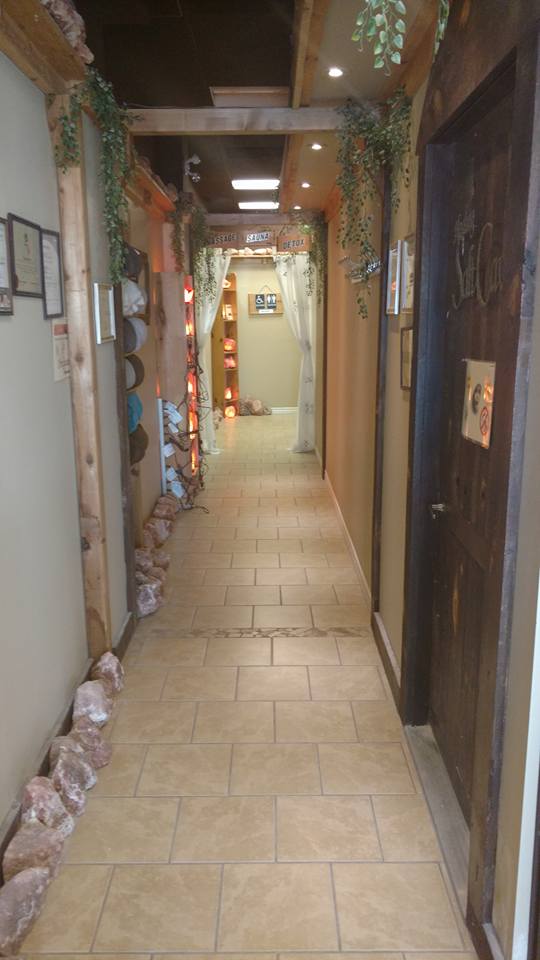 Walking down the hallway to the man made salt cave.