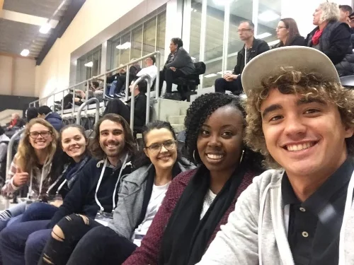 watching a wheelchair rugby game with new friends