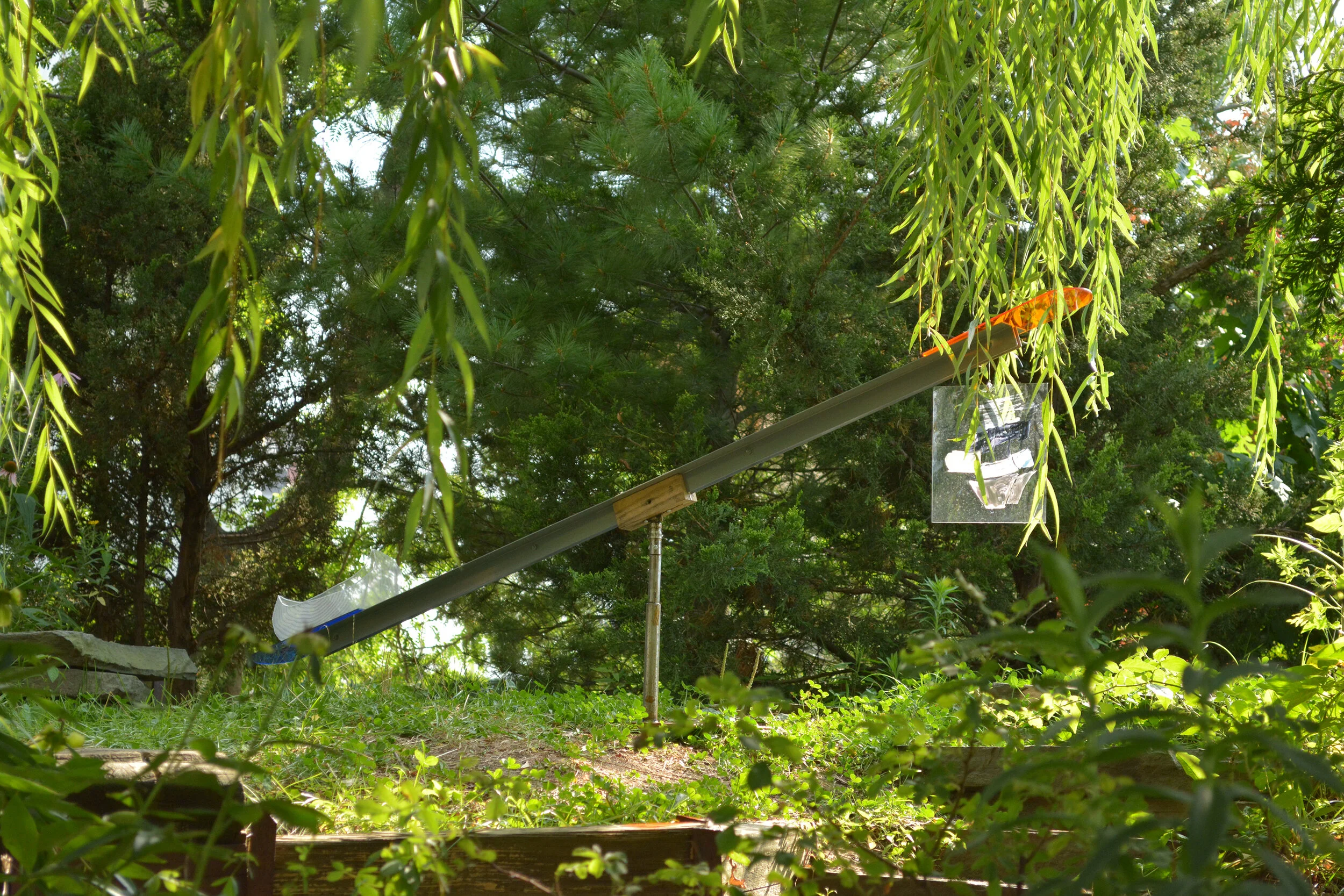 SEAsaw, 2021, kinetic sculpture, plexiglass, metal, mesh, acrylic paint.