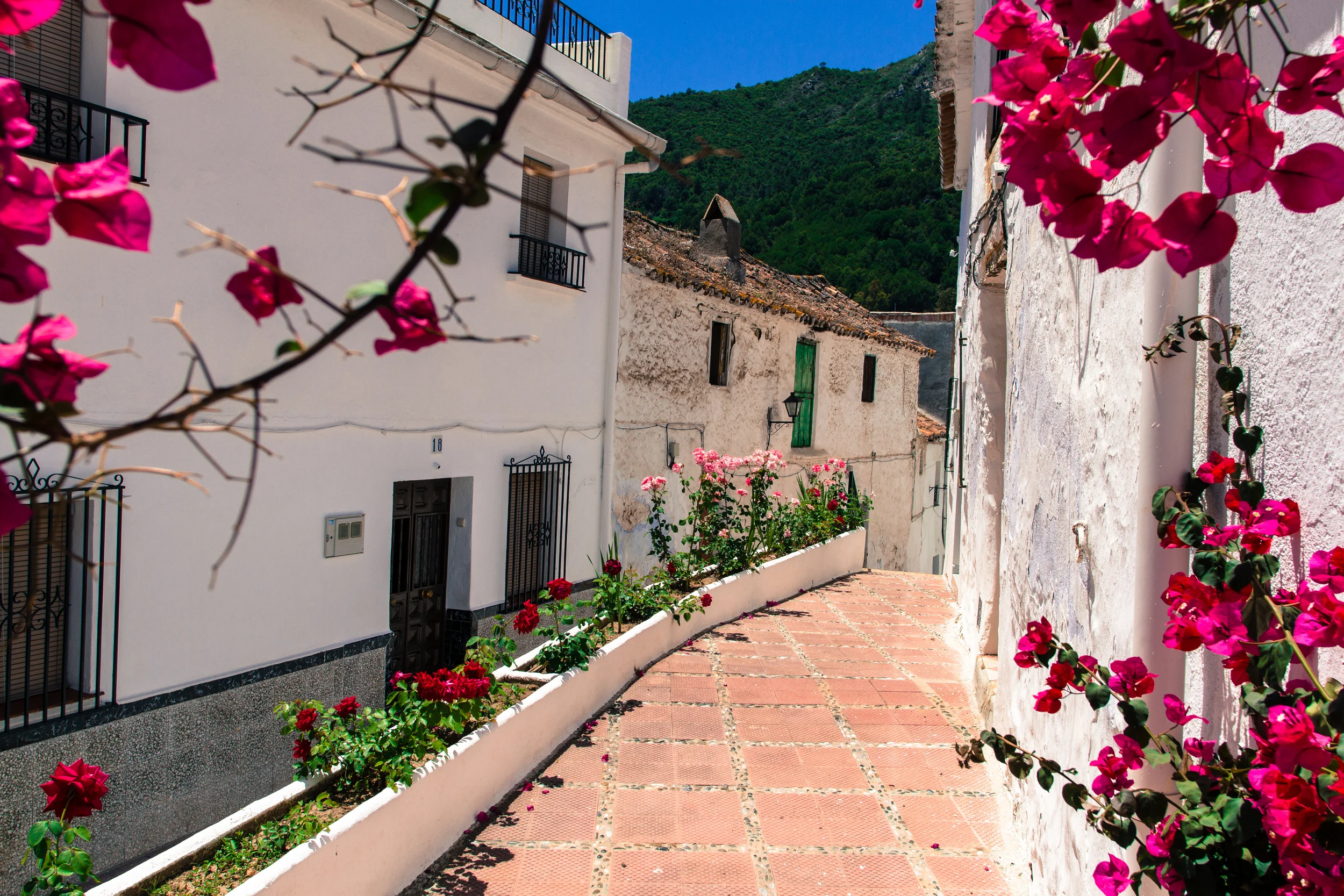 Small street in Ojen. The best all-mountain trails in the area are located around the city.