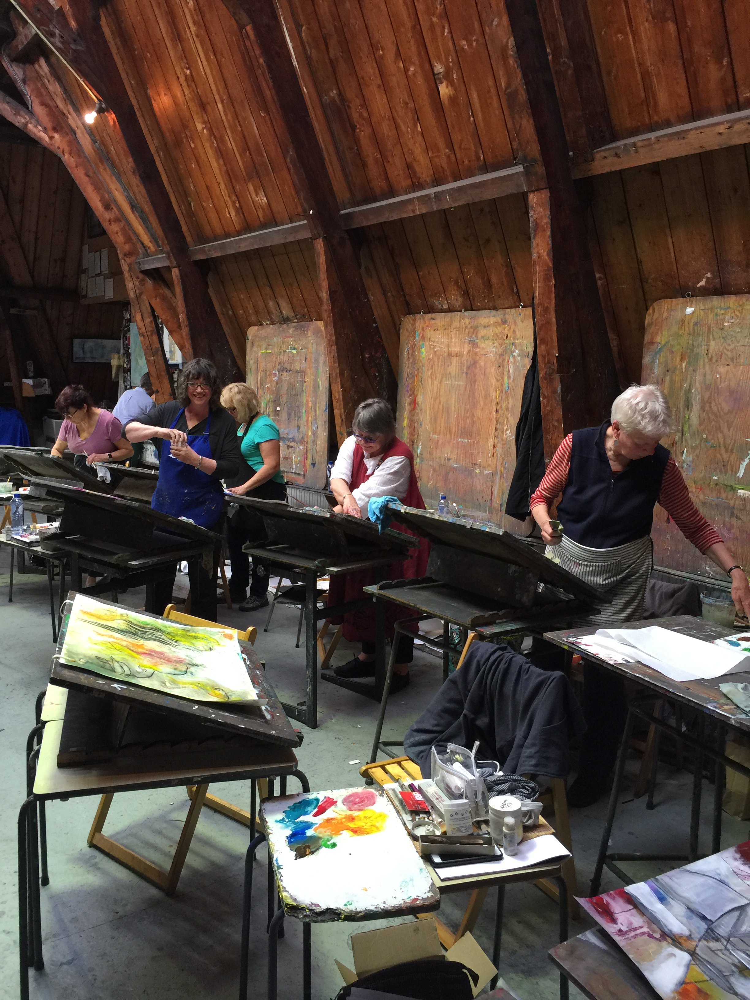 Some of the artists from Free Spirits Bellissima Art Escape enjoying their time in the studio