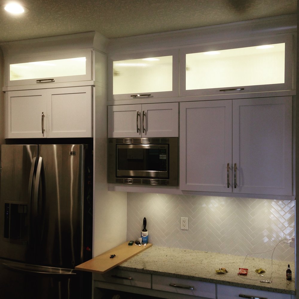 Extended cabinets to the ceiling.