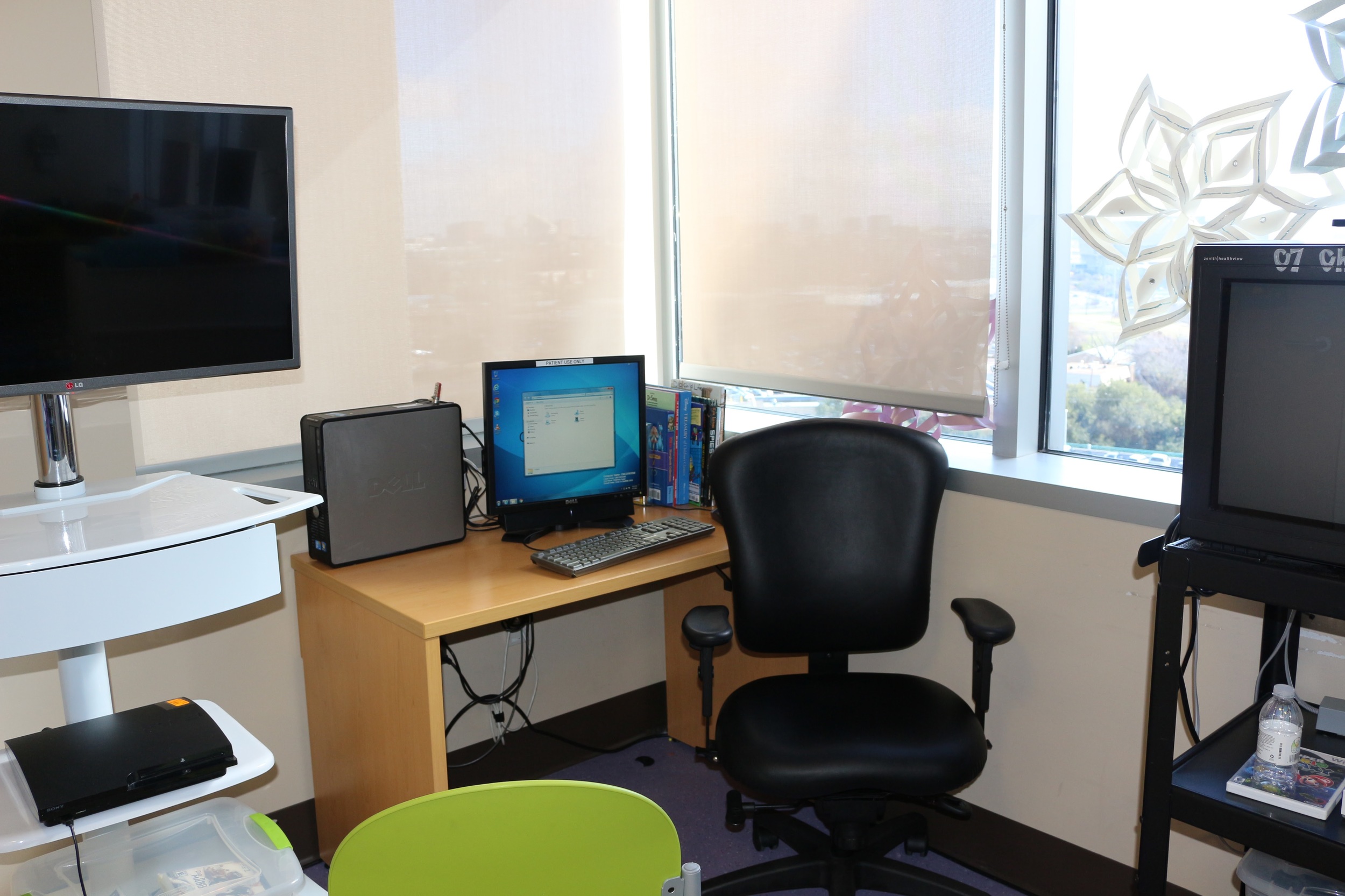 A Playstation and public access computer for patients to use.