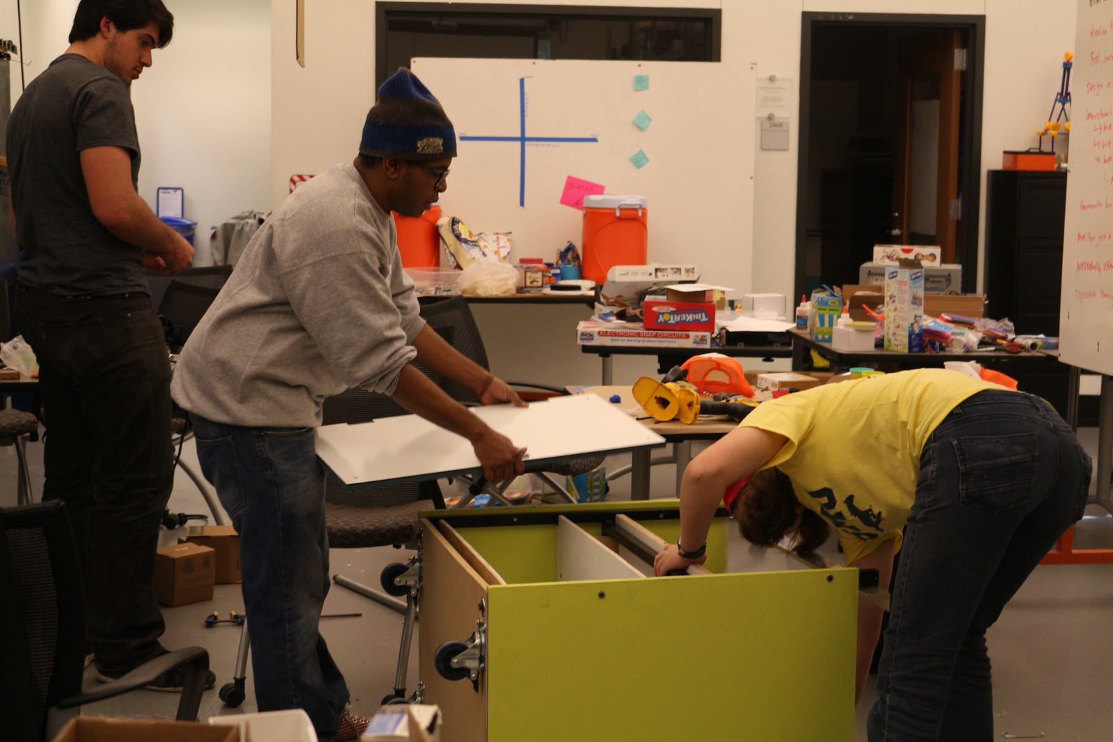 Mounting doors onto our cart.