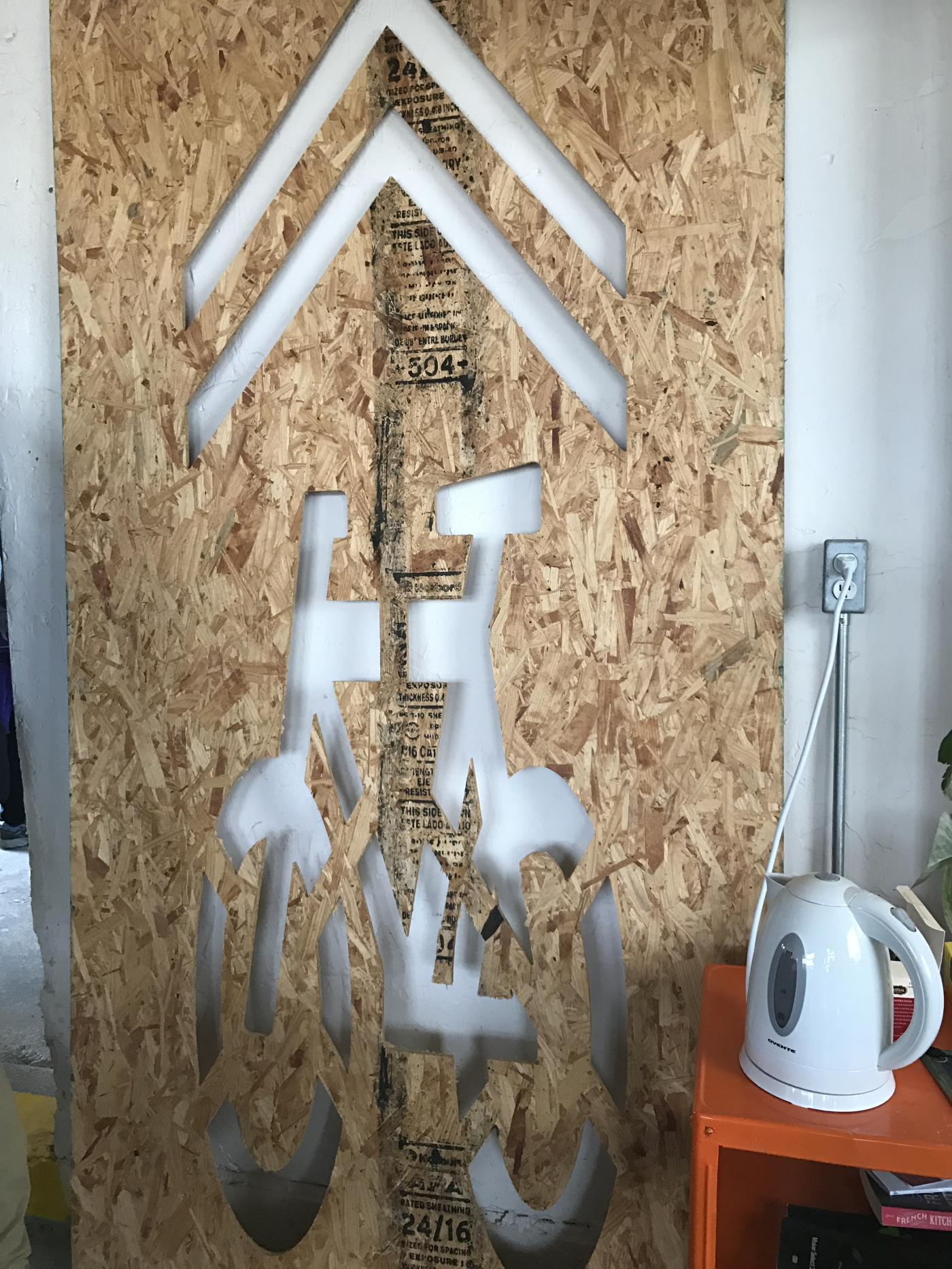 A stencil for a bike lane indicator cut on a CNC router.
