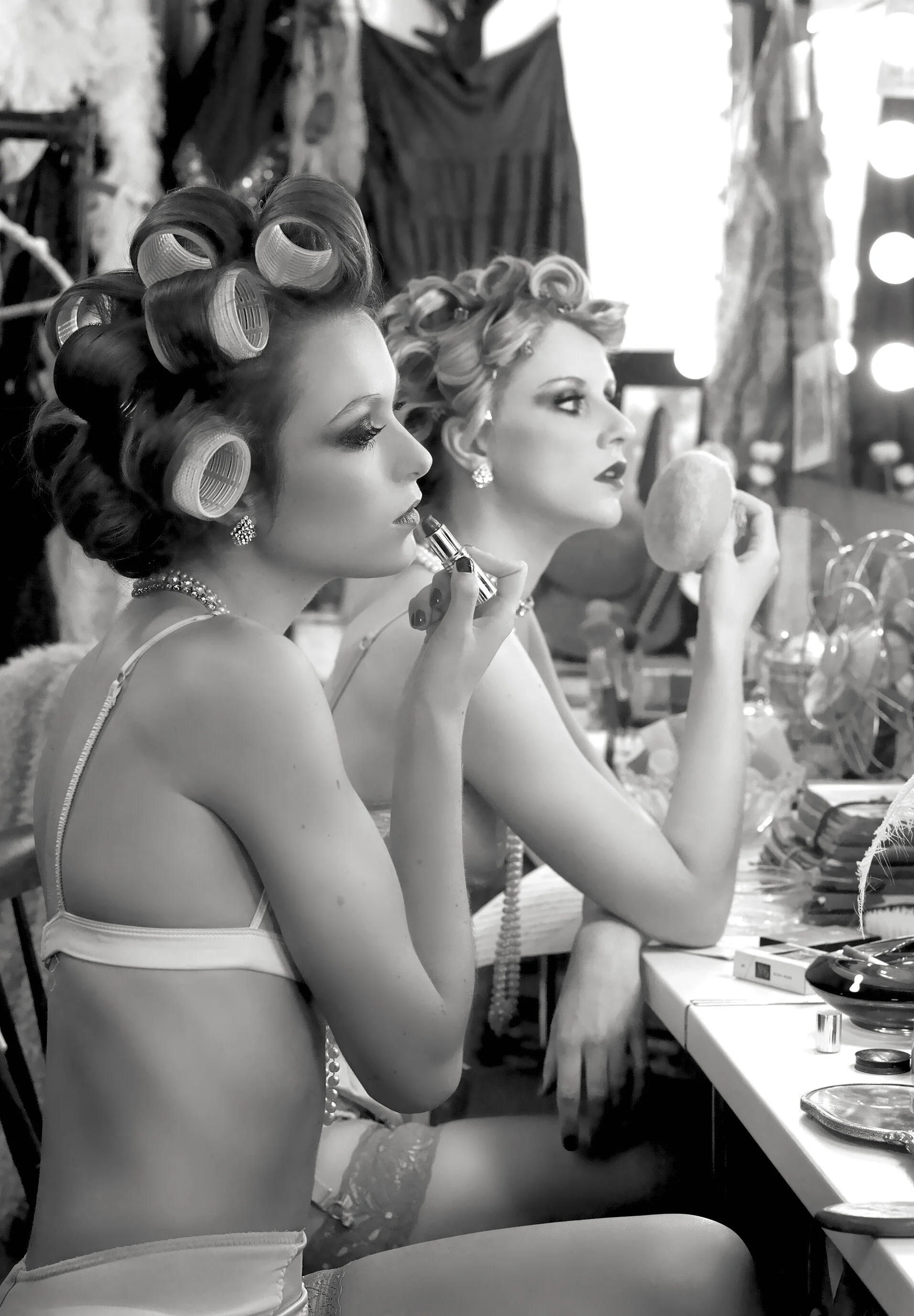 Claudia and Fran apply make up