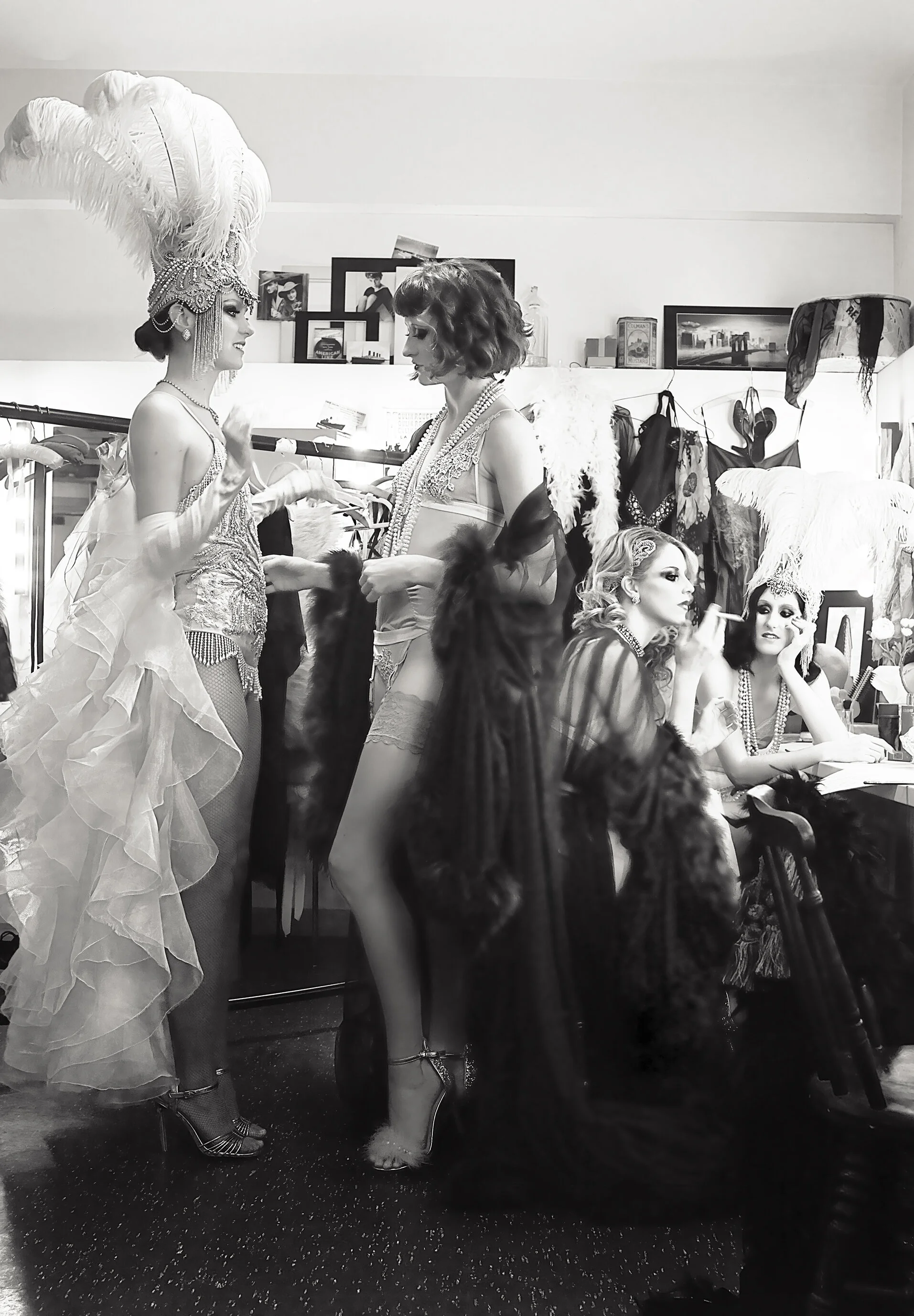 Claudia and Janet standing, Fran and Ami sitting