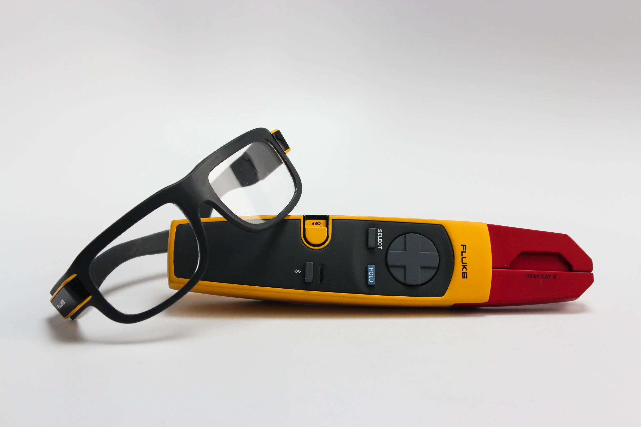 Photo of physical model. 3D modeled in Rhino, 3D printed with MakerBot, and hand finished and painted. Hand tool by Kelly Numamoto. Glasses by Henry Galvin. System concept and functionality collaboratively designed.