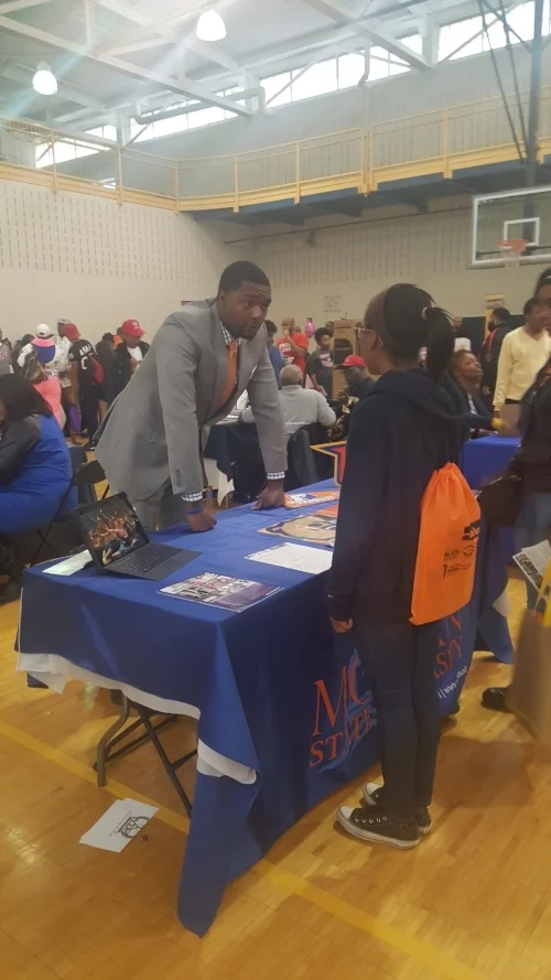 Kay talking to a rep from Morgan State University