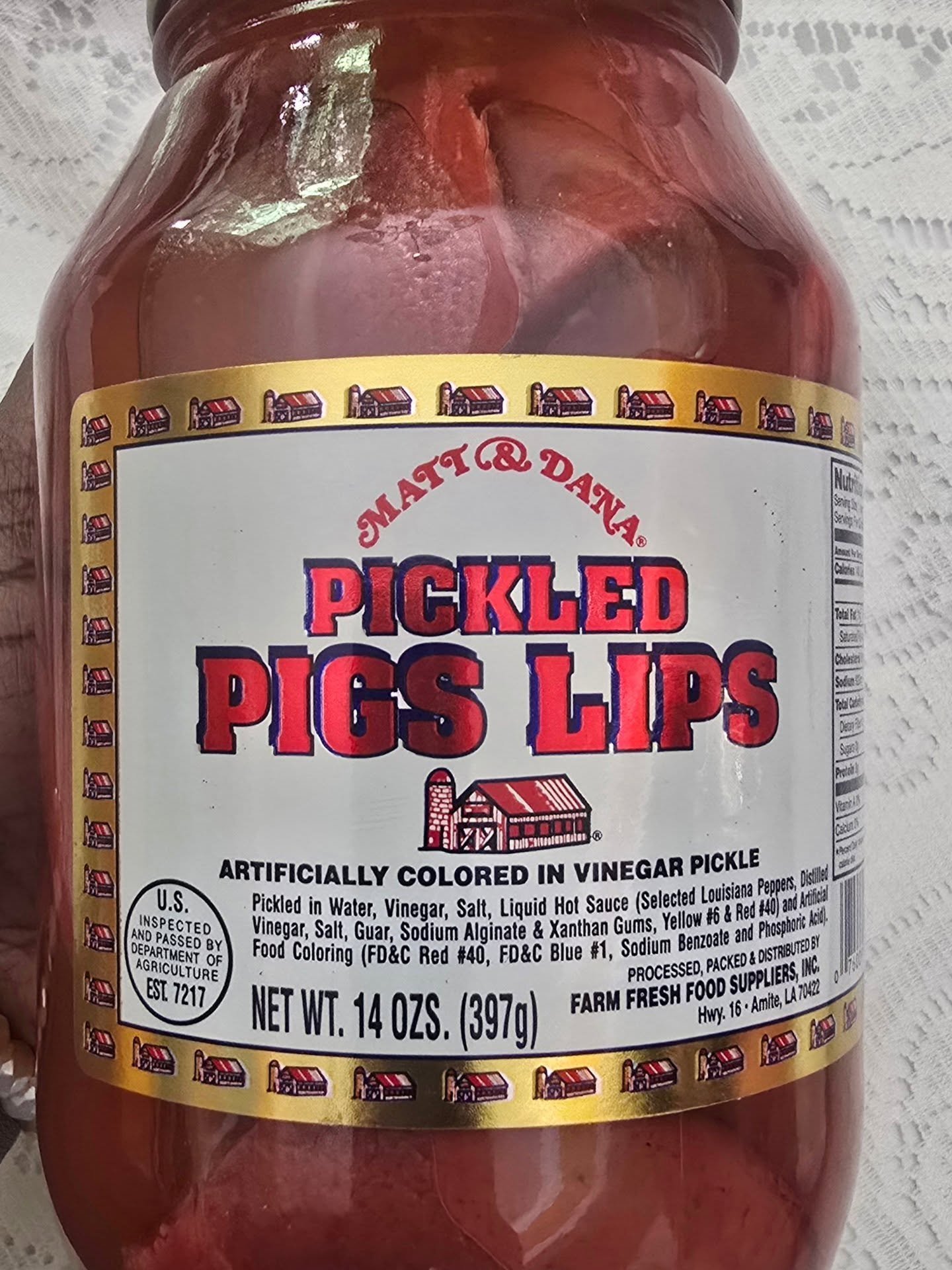 Pickled pigs lips. 

Have you eaten them?  Would you try them? 

I grew up in Granville County, NC and I've eaten pork my whole life.  I know many people who eat pigs feet (I don't), but I've never heard of eating pigs lips until now. 🤷🏾&zwj;♀️
___