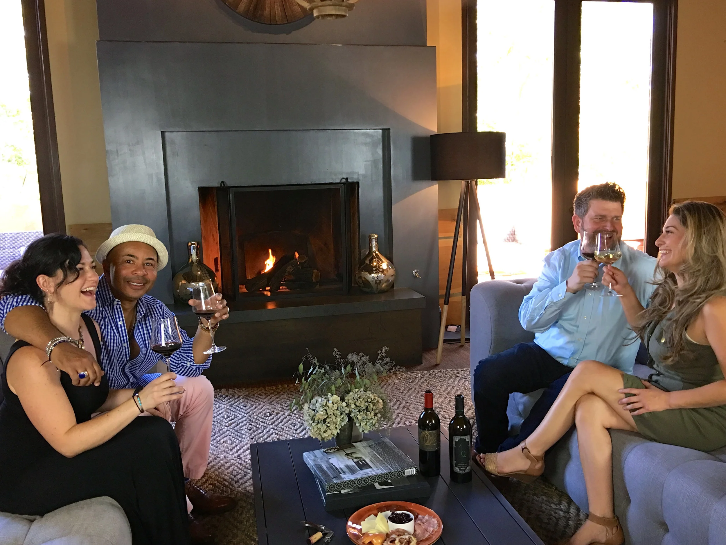 Garret enjoying some fireside time with members in the lounge( Photo: Mike Casey, The 29 Napa )