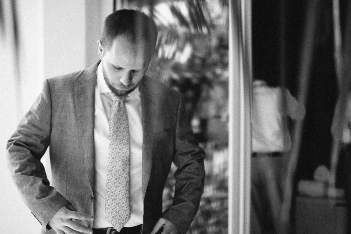 Punta Cana destination wedding, groom enjoys a quiet moment alone before his wedding