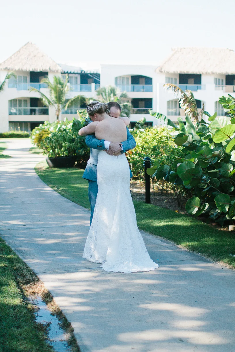 Punta Cana destination wedding, bride and groom embrace during their first look before their ceremony