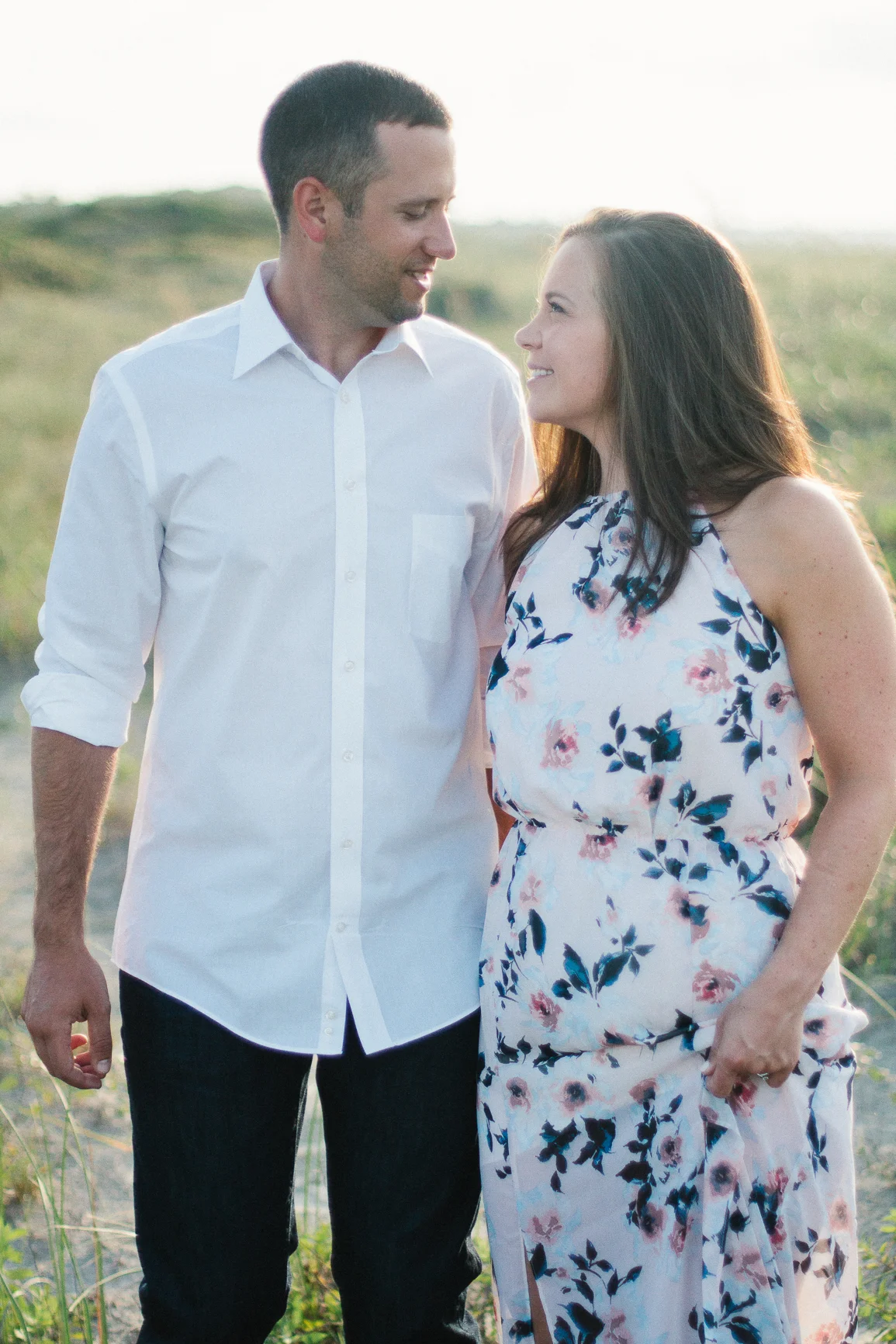 Engaged couple smiling at Kiawah Island Beach Resort, Kiawah Island South Carolina by Danielle Gallo Photography