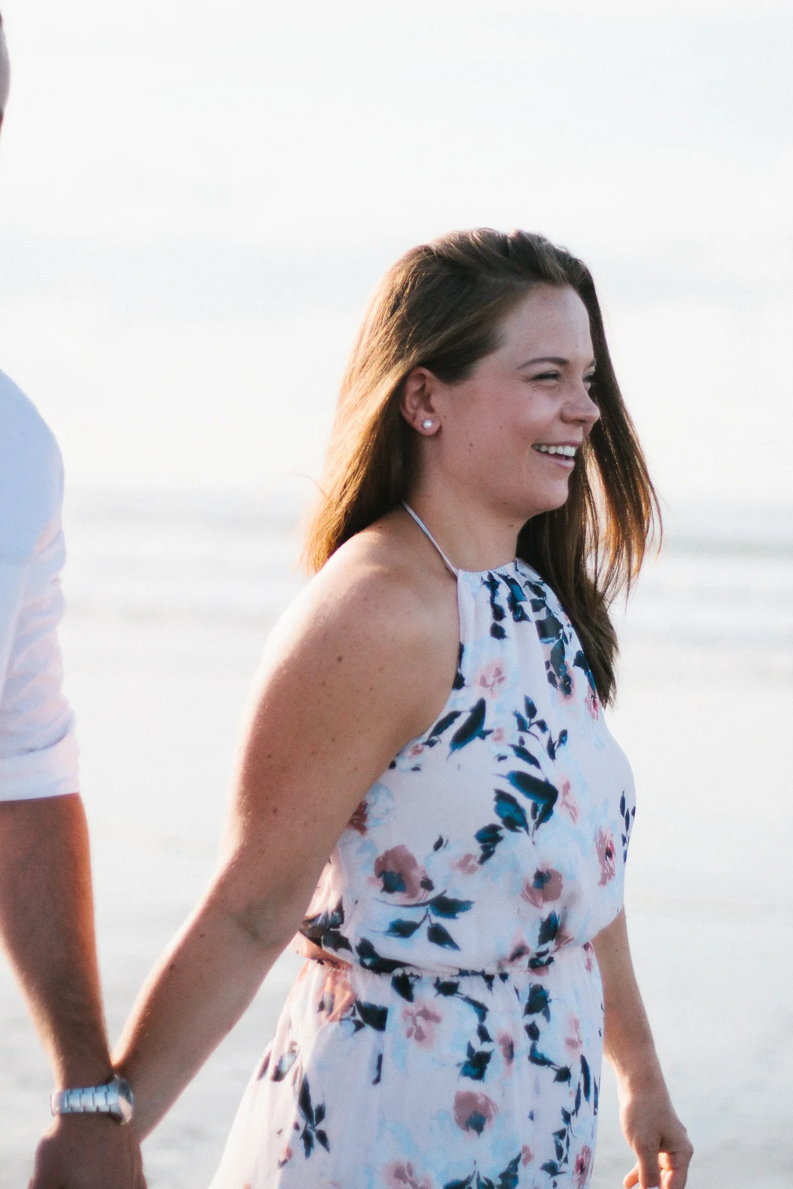 Engaged couple walking on the beach in the moring at Kiawah Island Beach Resort, Kiawah Island South Carolina by Danielle Gallo Photography