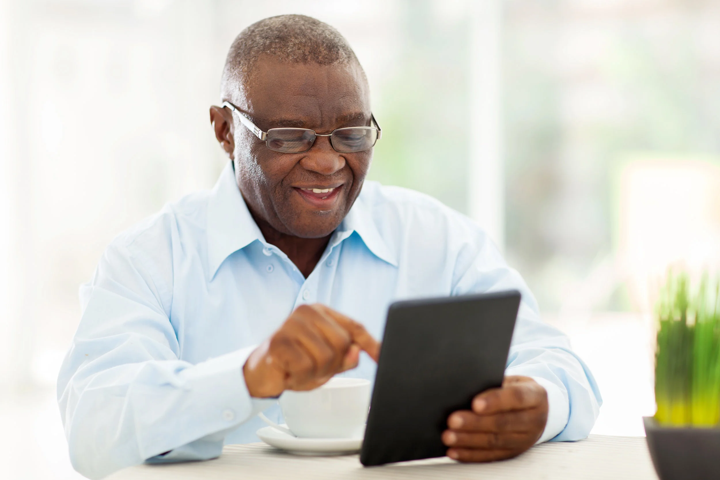 man on tablet.jpg