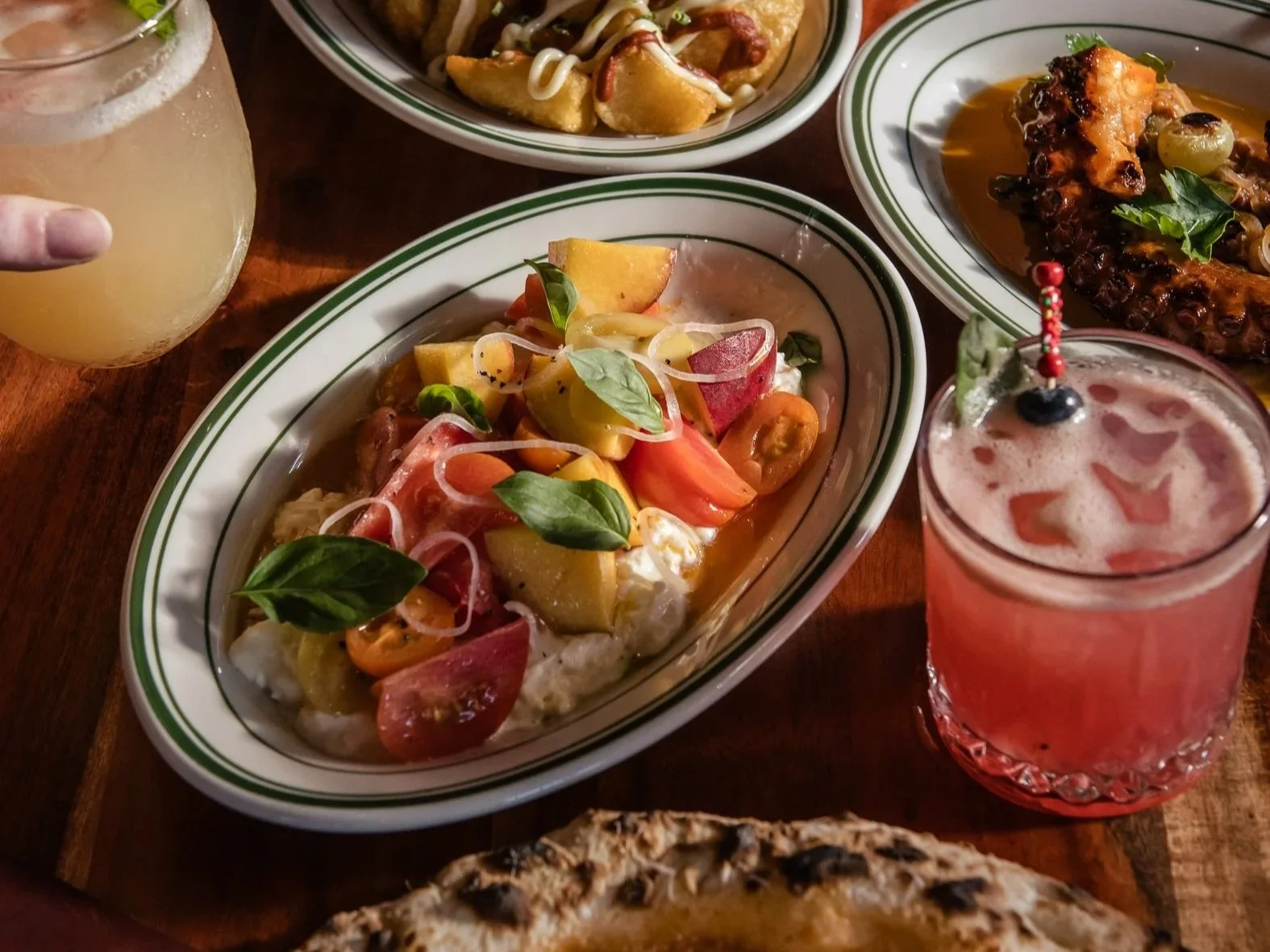  The food menu is regularly updated, with local produce making up the bulk of the offering. Think charred octopus with smoked almonds, saffron and cos; woodfired pizzas; a classic chicken schnitzel served with a lemon and parmesan sauce; and summer g