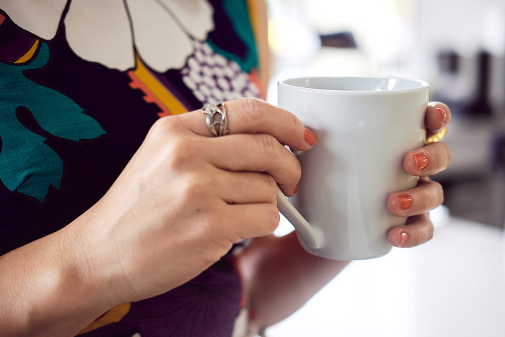 close-up-of-hands-on-coffee-mug.jpg
