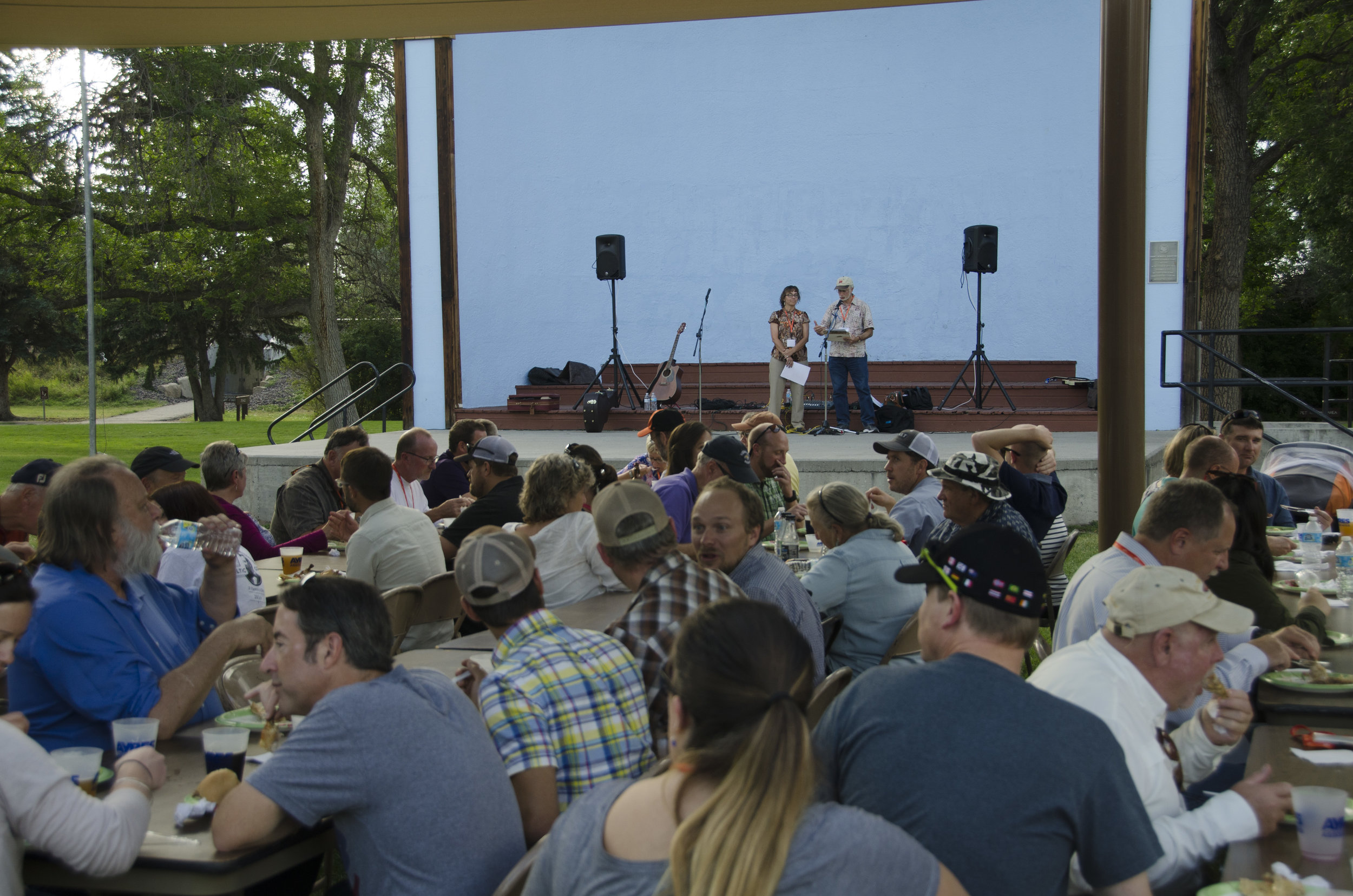 AWARDS DINNER. Angela Parker, AICP, and Dan Pava, AICP, announce the 2016 Western Planner Awards at the annual barbecue held this year in Great Falls. Photo by Rachel Girt.