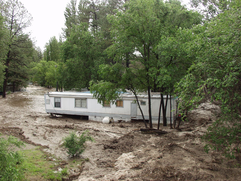The power of flash flooding in the mountain town of Ruidoso, New Mexico in 2008. Photo courtesy of New Mexico Floodplain Managers Association.