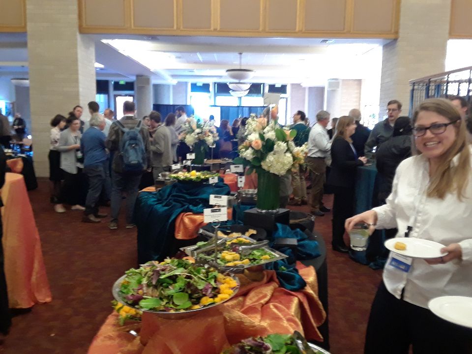 Folks enjoy great food at the reception after a full day of sessions at the 28th Rocky Mountain Land Use Institute, held at the University of Denver Sturm College of Law.