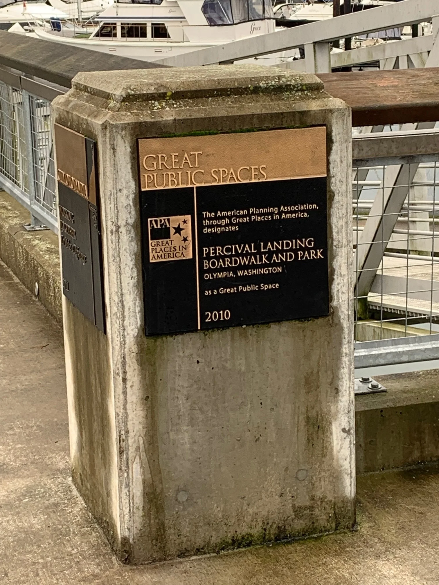 Plaque commemorating APA's Great Places in America award given to the City for Percival Landing in 2010: Courtesy - Candi Millar