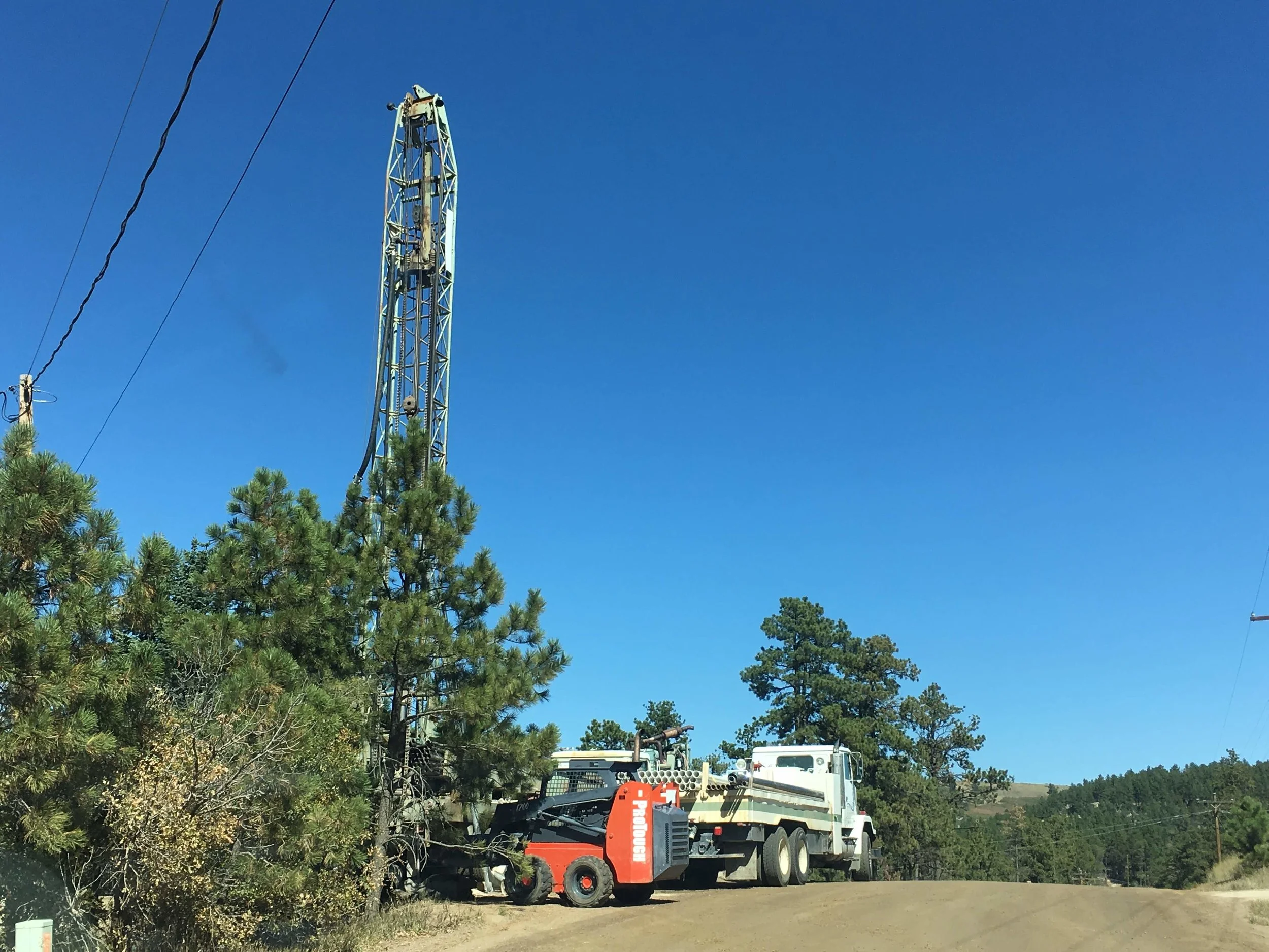Well rig drilling in the neighborhood.